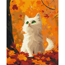 Киця в опалому листі